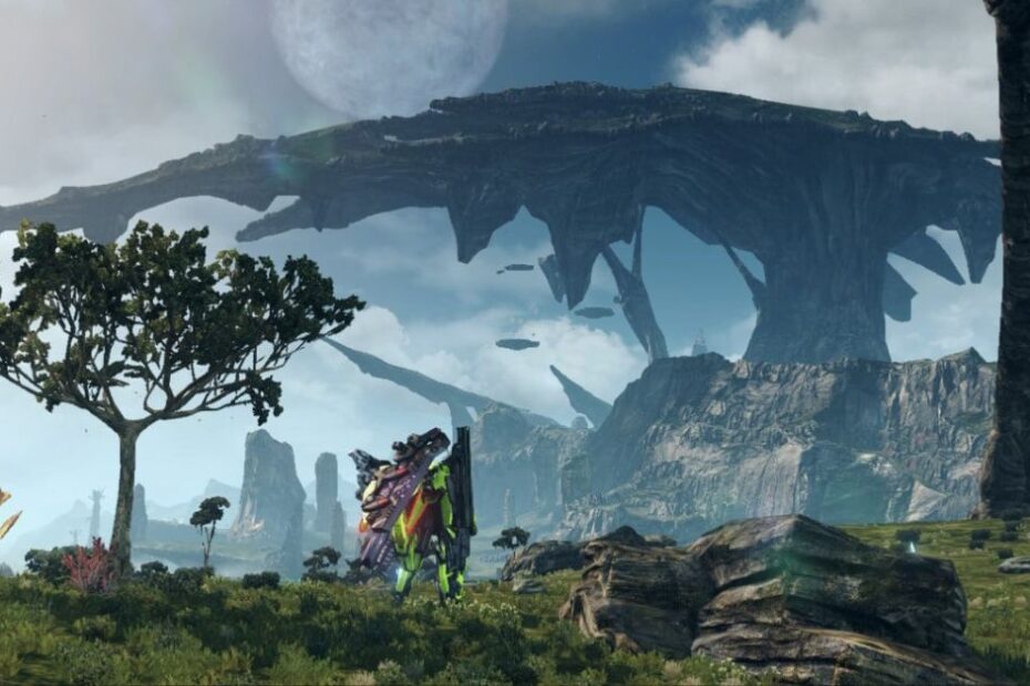 A stunning landscape from *Xenoblade Chronicles X*, featuring a player character in advanced armor standing in a vast open field. A massive floating landmass dominates the sky, with alien flora and rock formations scattered across the terrain. The scene is bathed in soft natural light, enhancing the game's sci-fi fantasy aesthetic.