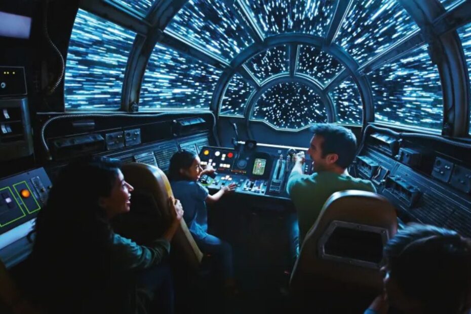 First look inside the Millennium Falcon: Smugglers Run ride at Star Wars: Galaxy's Edge in Disneyland, showcasing the iconic cockpit and immersive Star Wars-themed controls and seating.