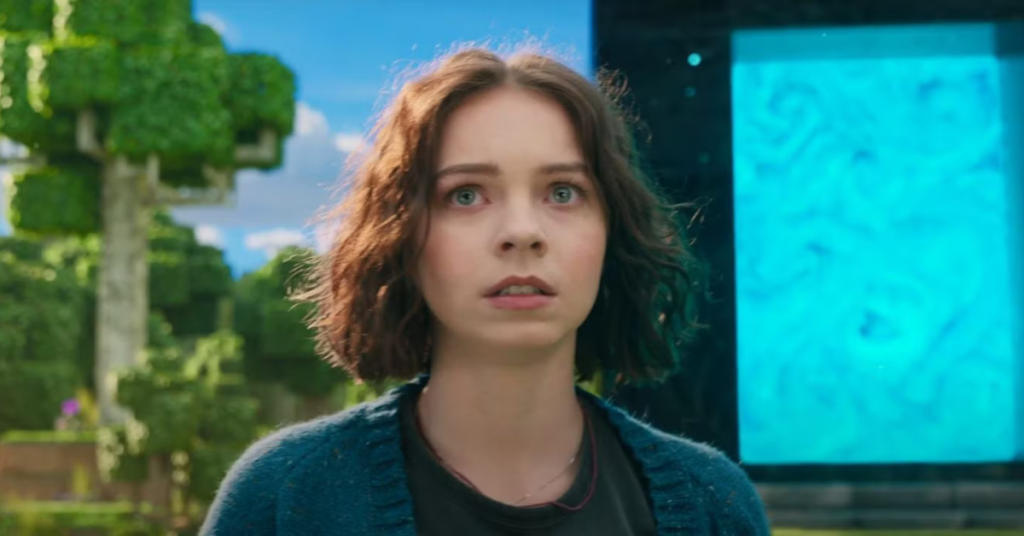 Emma Myers as a lead character in A Minecraft Movie, wearing a pixel-themed costume on set.